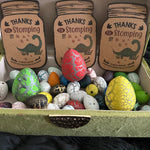 A collection of colorful crackle dinosaur eggs displayed with a “Thanks for Stomping By” tag, perfect for kids’ dinosaur-themed birthday favors or classroom gifts.
